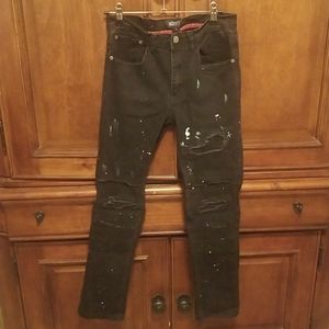 Ripped splatter black jeans.